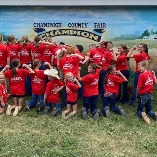 Prairieland Feed staff posing at the Champaign County Fair