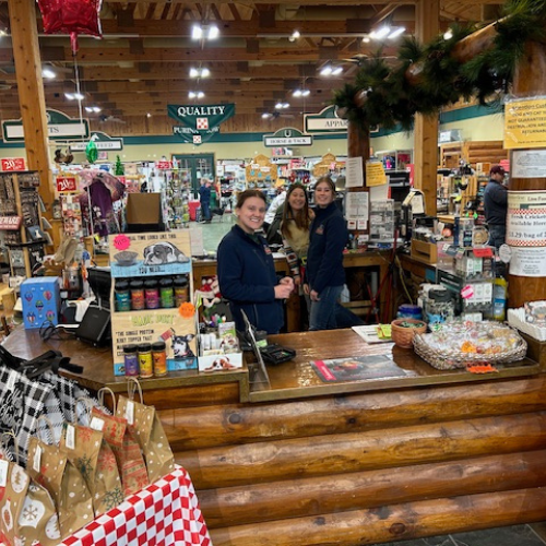 Staff behind the registers inside of Prairieland Feed